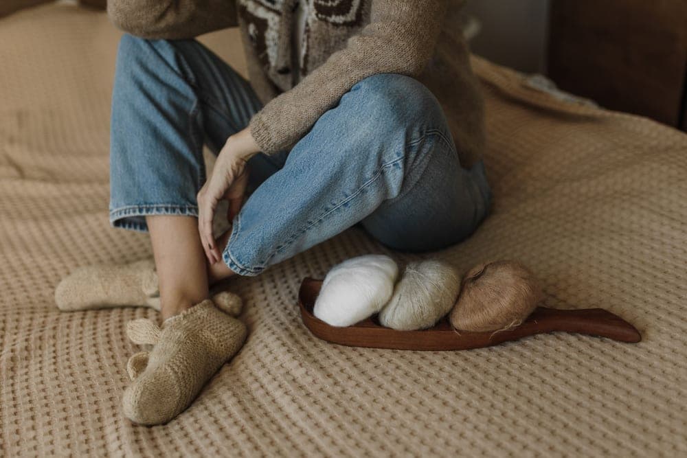 Thick knit wool socks folded in a pile, the weight most hunters need